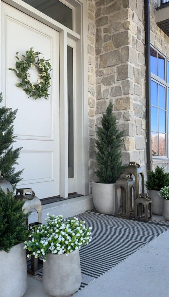 My front porch with faux outdoor plants 