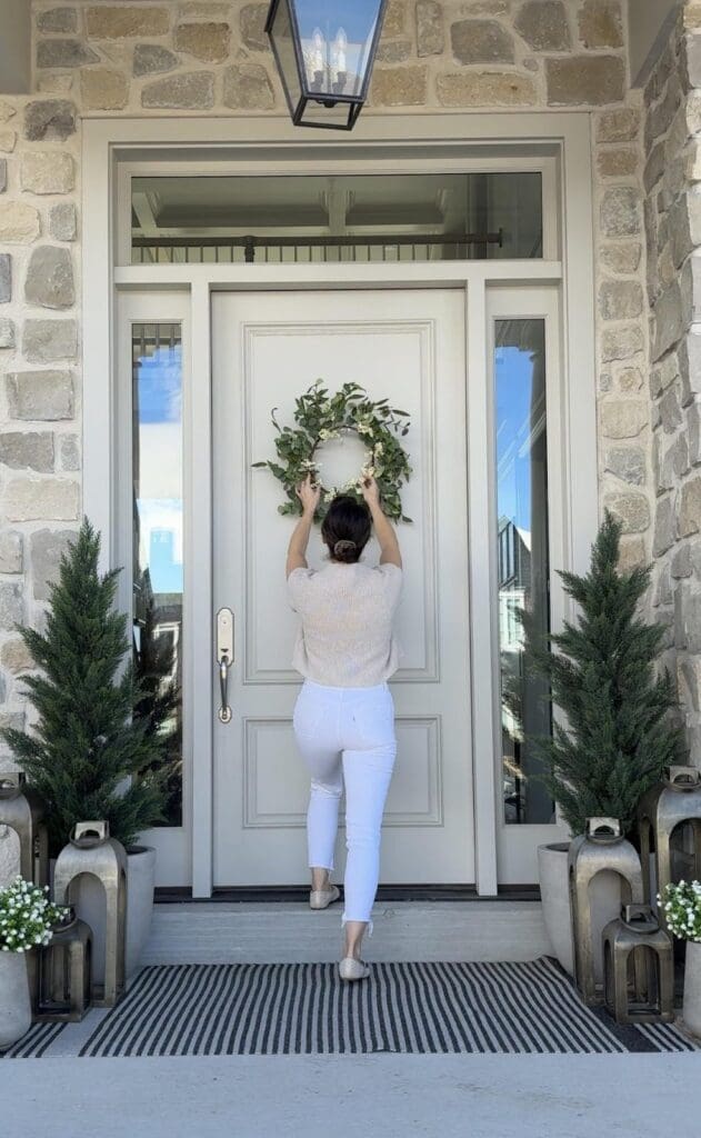 Andrea decorating her Front porch