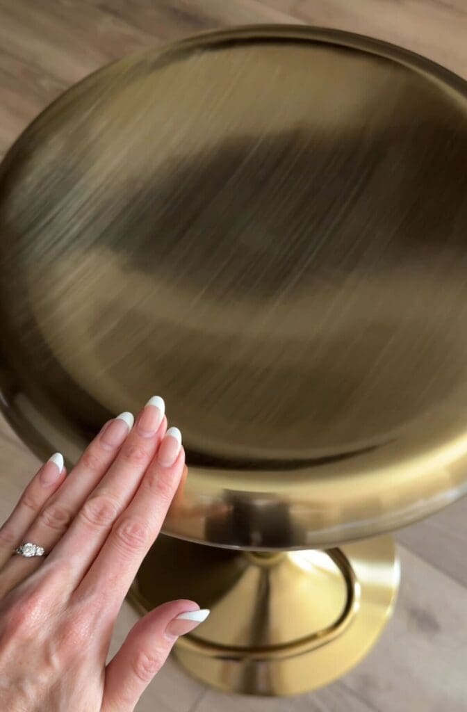 Gently placing my hand on my swivel bar stool 