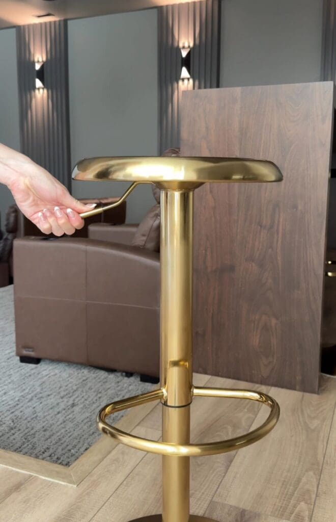 Holding the height control on my swivel bar stool 
