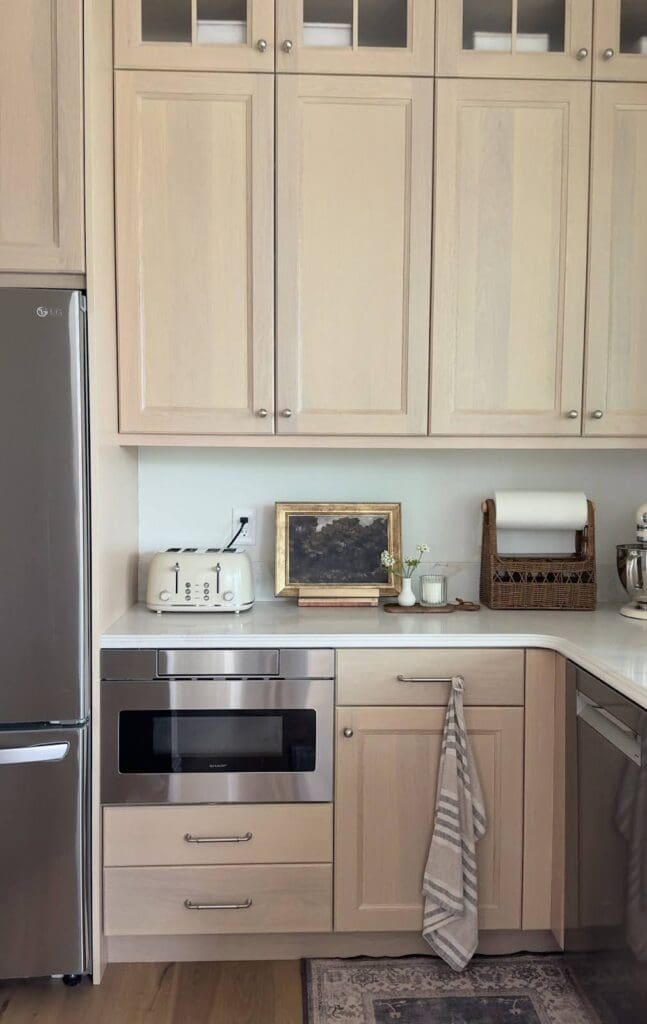 Full view of kitchen with cabinetry where straw organizer is installed